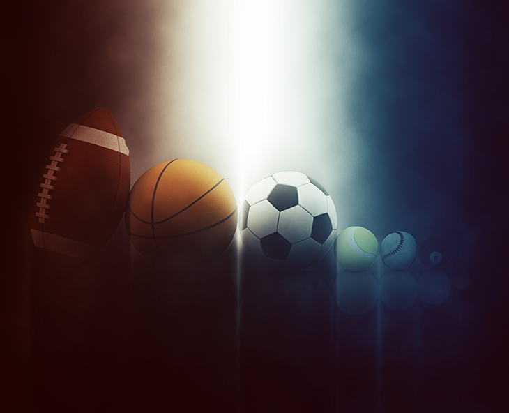 3D render of various sports balls on dramatic background